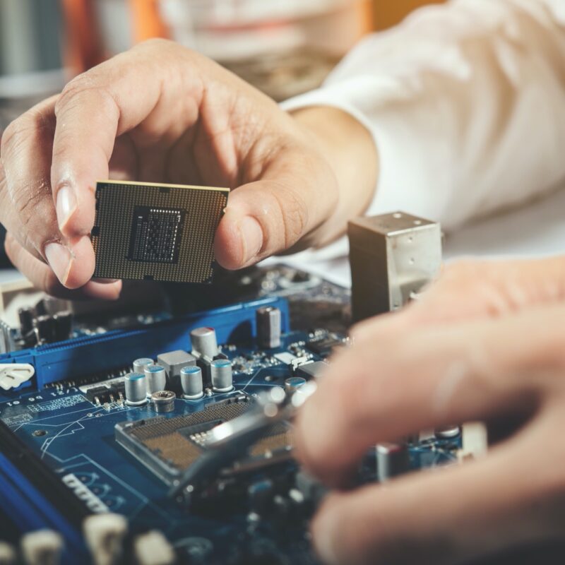 The technician repairing the computer,computer hardware, repairing, upgrade and technology